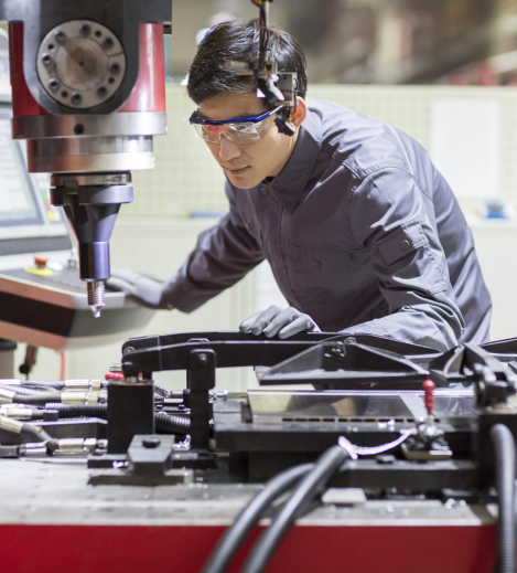 young-engineer-working-in-the-factory-2022-03-25-00-25-56-utc-scaled
